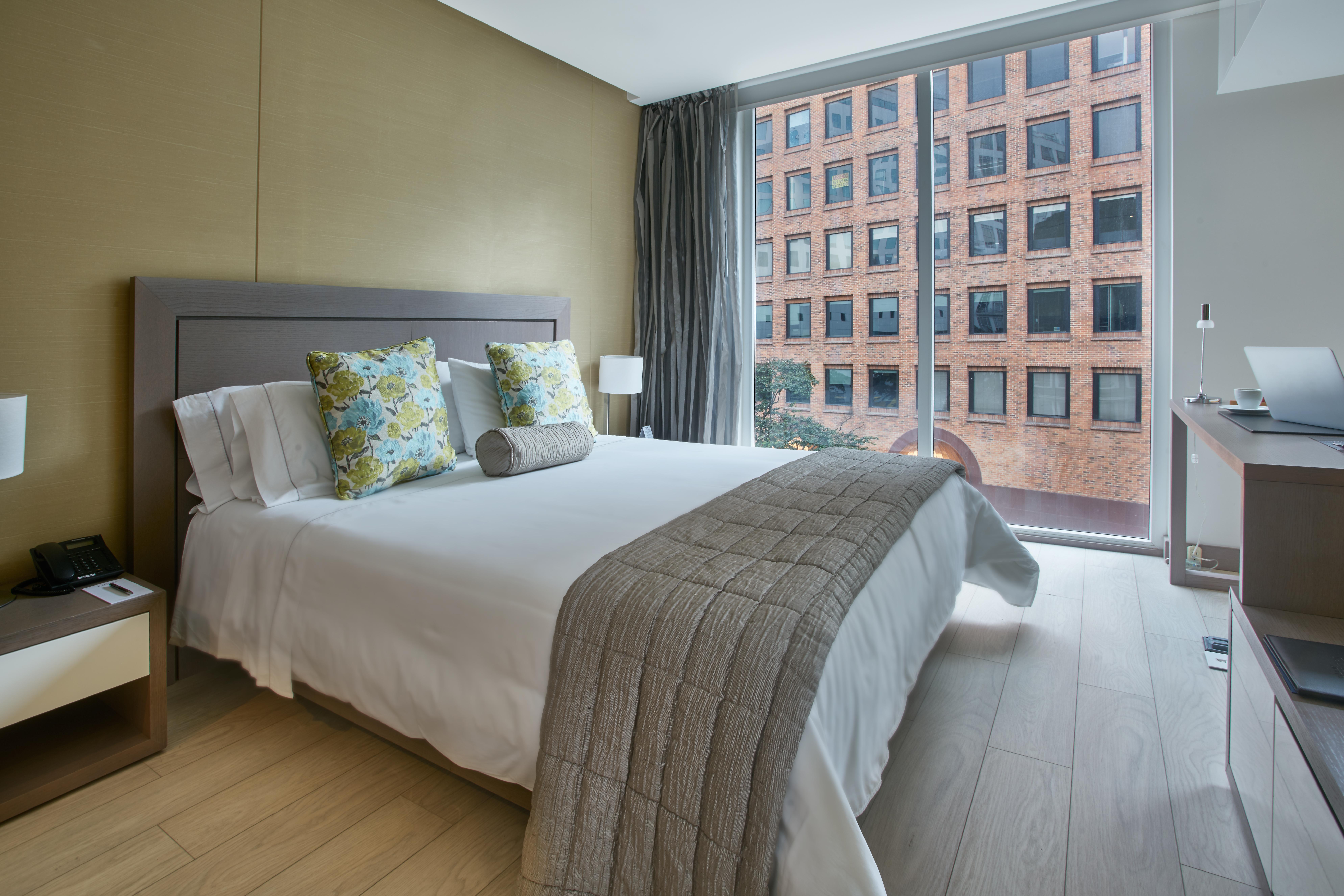 Hotel 100 Luxury Suites By Preferred Bogotá Eksteriør billede A bedroom at the hotel