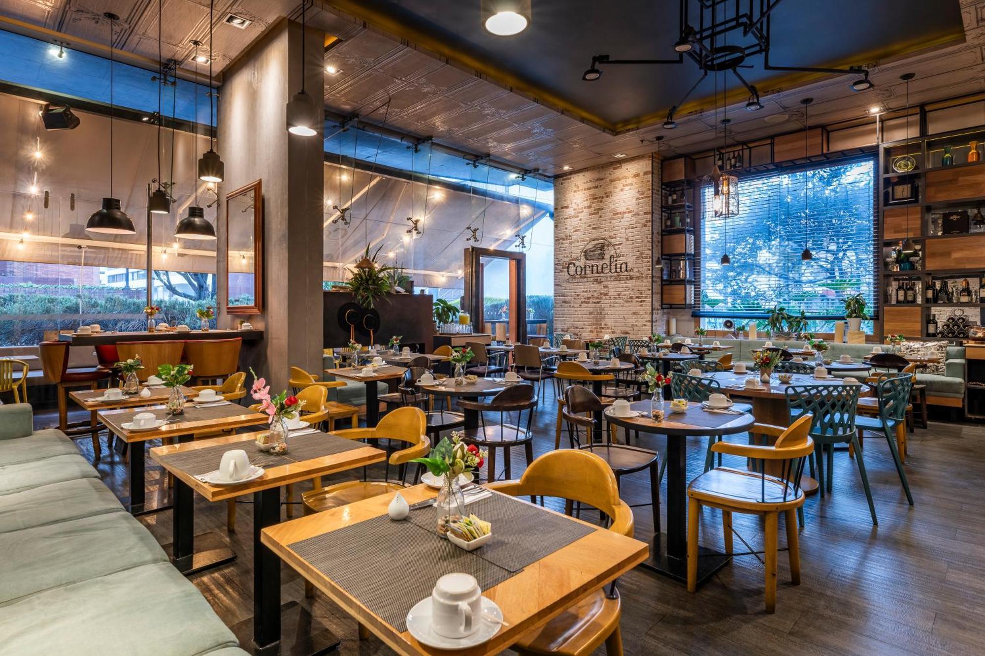 Hotel 100 Luxury Suites By Preferred Bogotá Eksteriør billede Restaurant in the hotel