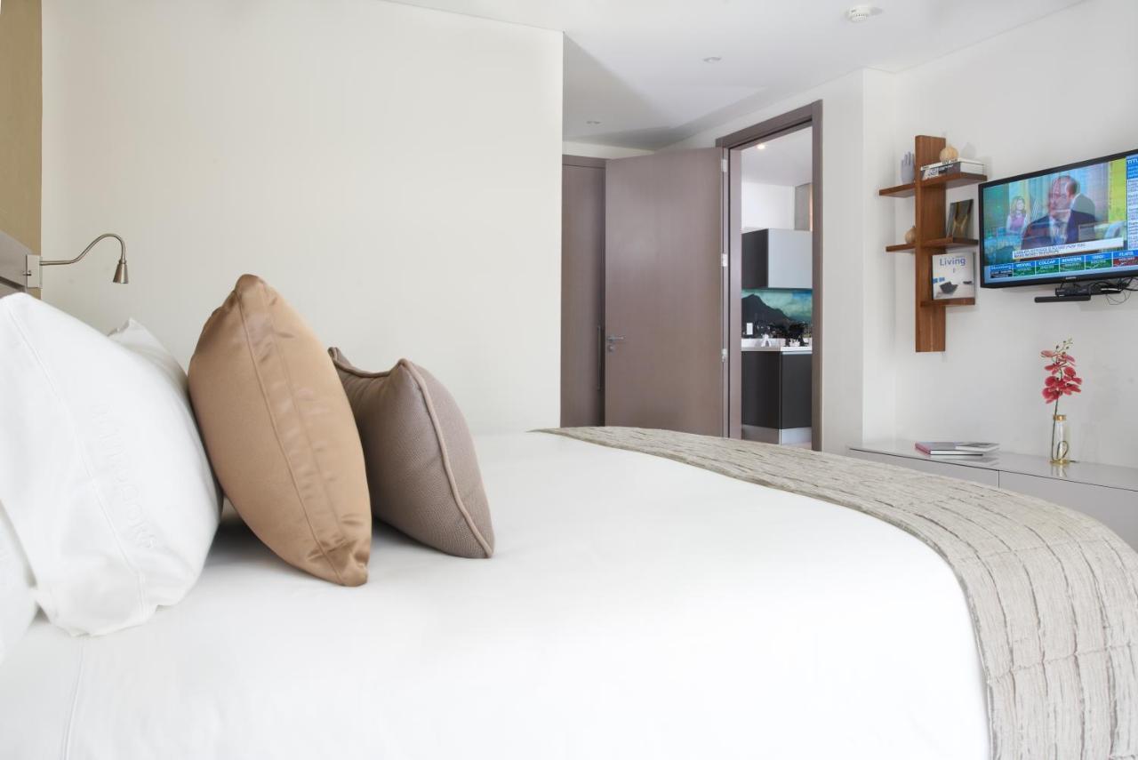 Hotel 100 Luxury Suites By Preferred Bogotá Eksteriør billede A bedroom at the hotel